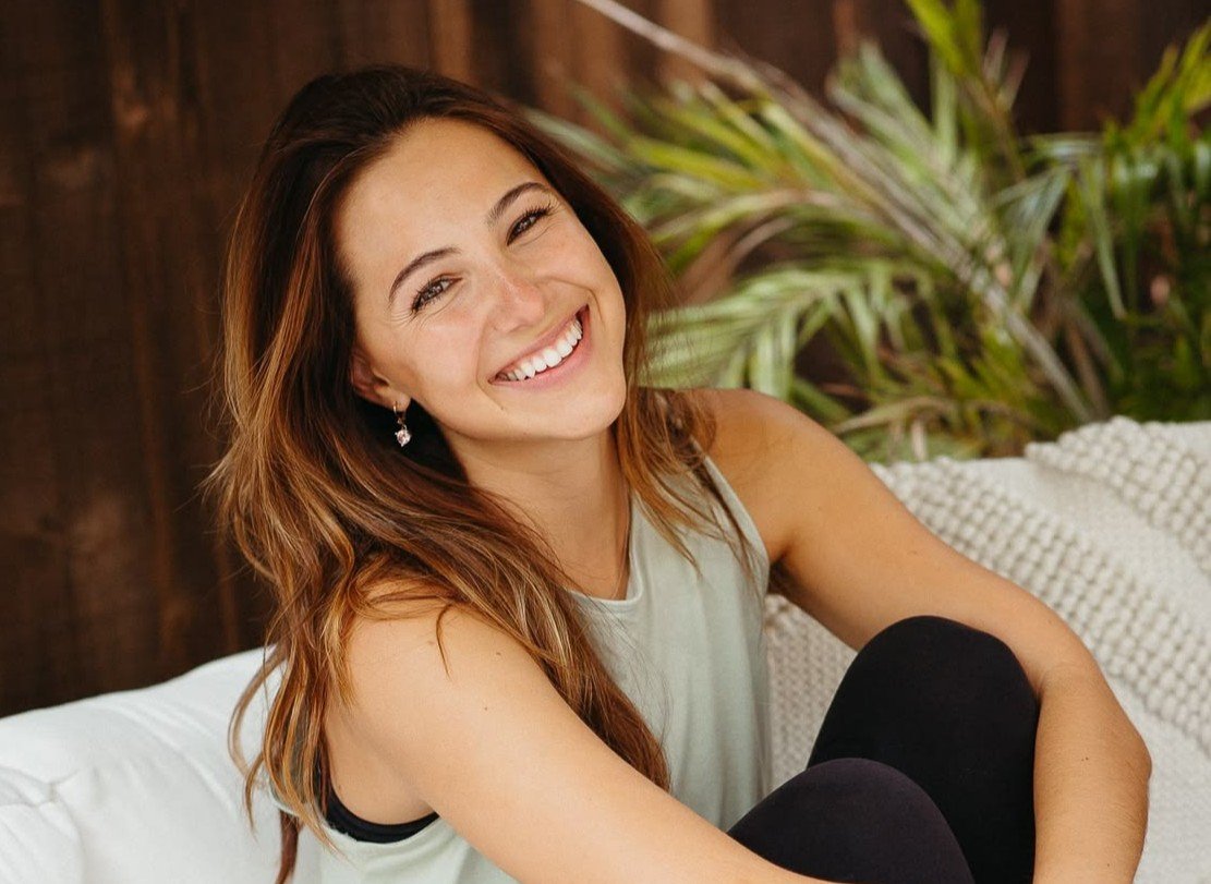 Smiling woman celebrating her moment